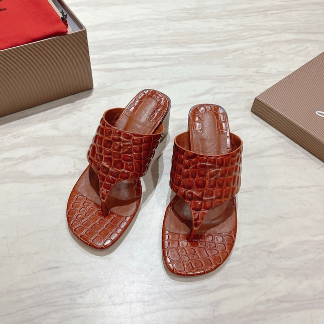 EMBOIDERED LOGO MULES IN COGNAC BROWN EMBOSSED CALFSKIN