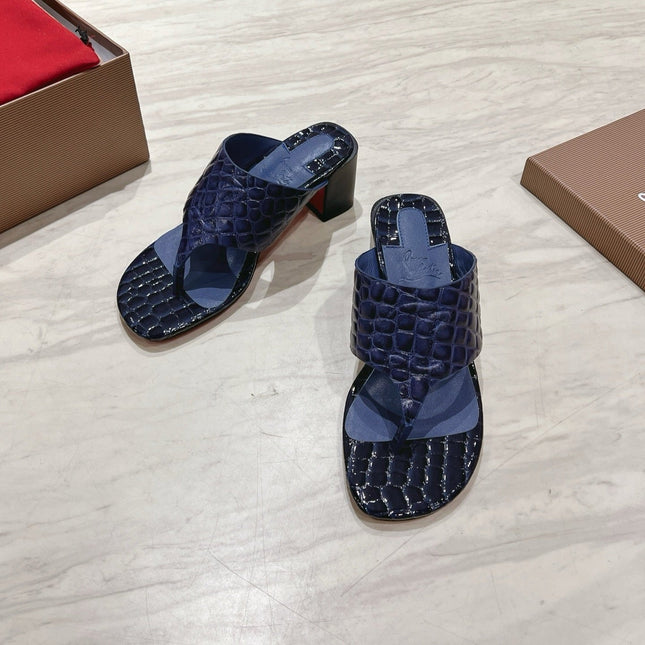EMBOIDERED LOGO MULES IN NAVY BLUE EMBOSSED CALFSKIN