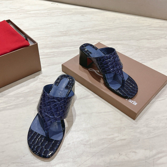 EMBOIDERED LOGO MULES IN NAVY BLUE EMBOSSED CALFSKIN