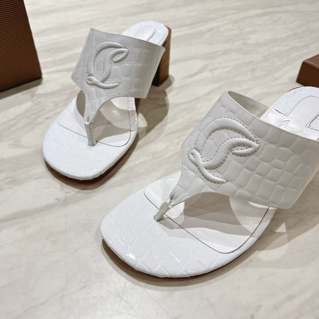 EMBOIDERED LOGO MULES IN WHITE EMBOSSED CALFSKIN