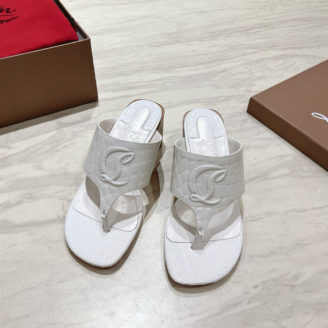 EMBOIDERED LOGO MULES IN WHITE EMBOSSED CALFSKIN