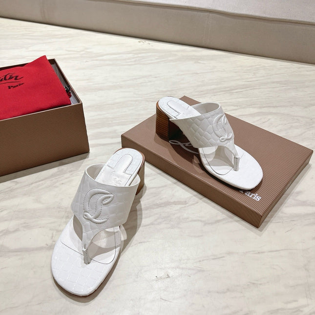 EMBOIDERED LOGO MULES IN WHITE EMBOSSED CALFSKIN