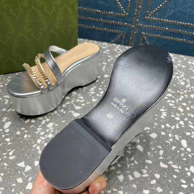 HIGH WEDGE PLATFORM IN SILVER CALFSKIN WITH GOLD HARDWARE