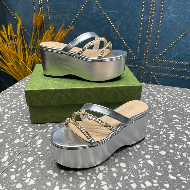 HIGH WEDGE PLATFORM IN SILVER CALFSKIN WITH GOLD HARDWARE