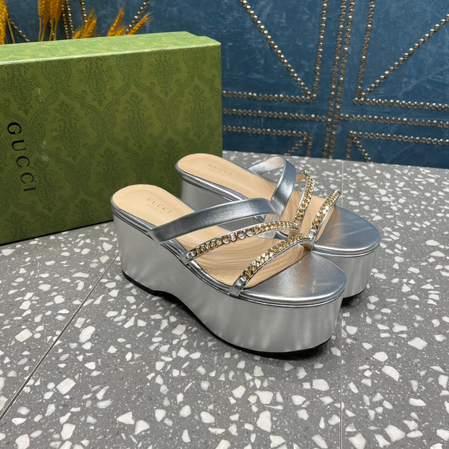 HIGH WEDGE PLATFORM IN SILVER CALFSKIN WITH GOLD HARDWARE