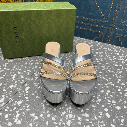 HIGH WEDGE PLATFORM IN SILVER CALFSKIN WITH GOLD HARDWARE