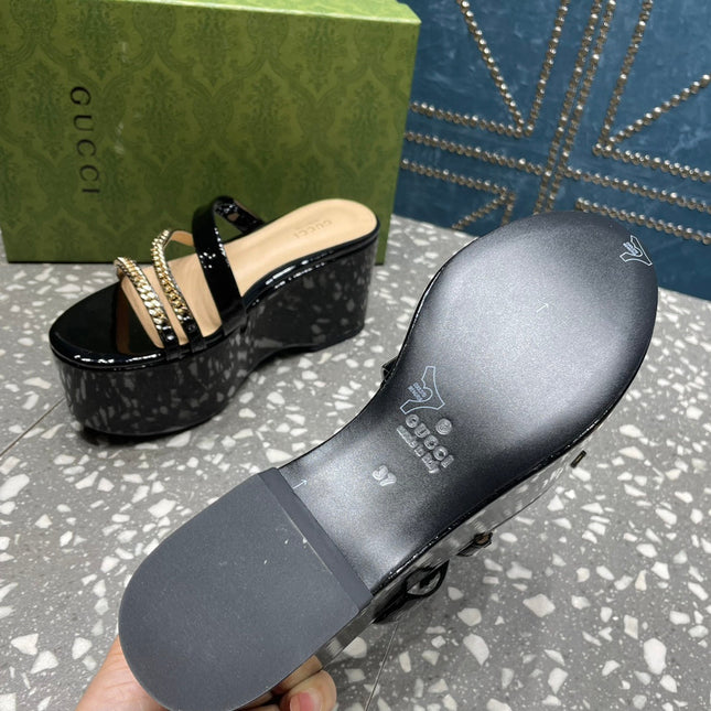 HIGH WEDGE PLATFORM IN BLACK CALFSKIN WITH GOLD HARDWARE