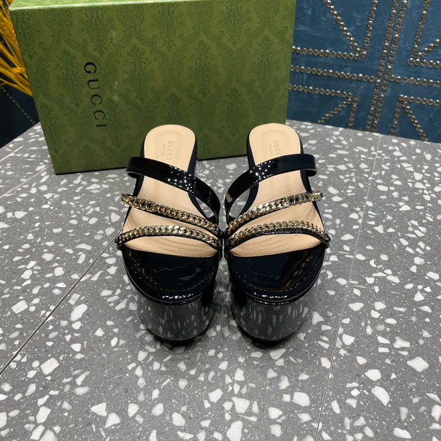 HIGH WEDGE PLATFORM IN BLACK CALFSKIN WITH GOLD HARDWARE