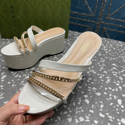 HIGH WEDGE PLATFORM IN WHITE CALFSKIN WITH GOLD HARDWARE