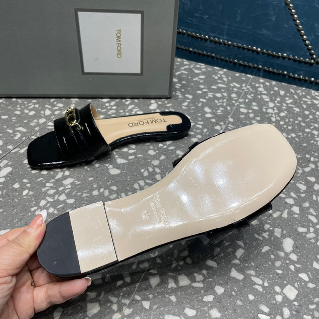 FLAT MULE IN BLACK CALFSKIN