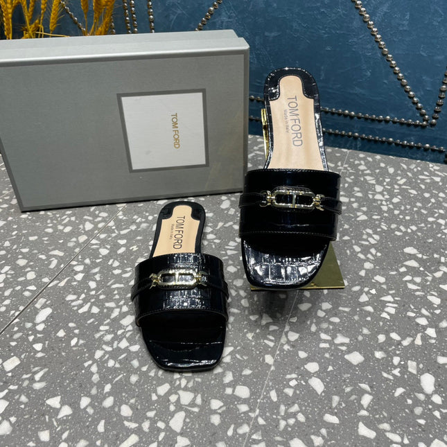 FLAT MULE IN BLACK CALFSKIN