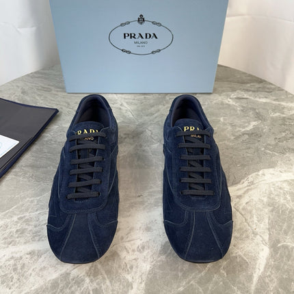 PRADA 25S MONTECARLO ANTIQUED SNEAKERS IN NAVY BLUE SUEDE