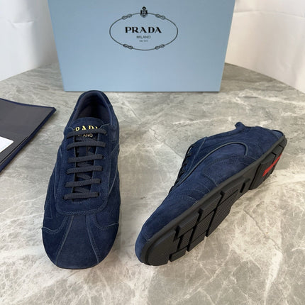 PRADA 25S MONTECARLO ANTIQUED SNEAKERS IN NAVY BLUE SUEDE
