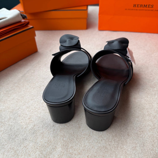 HIGH MULES IN BLACK CALFSKIN