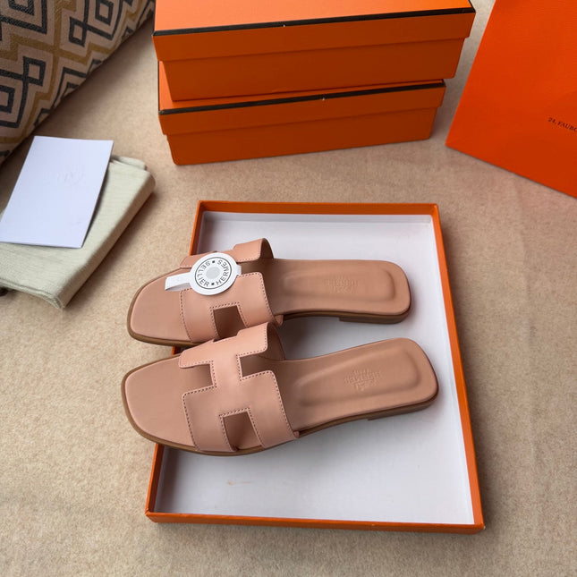0RAN SANDALS IN PEACH PINK CALFSKIN