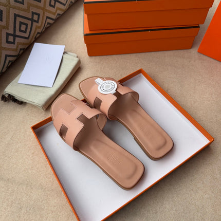 0RAN SANDALS IN PEACH PINK CALFSKIN