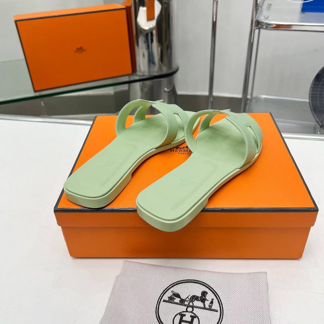 0RAN SANDALS IN GREEN PASTEL CALFSKIN