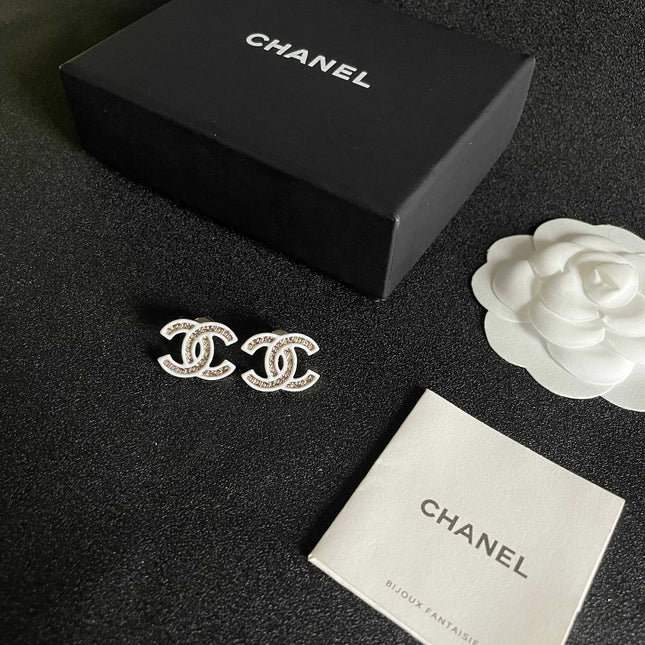 DOUBLE C STUD EARRINGS WITH WHITE TRIM AND CENTER STONE