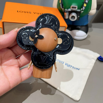 LV KEYCHAIN IN BLACK CALFSKIN AND WOOD