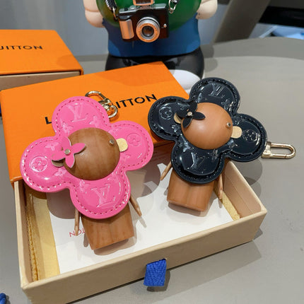 LV KEYCHAIN IN BLACK CALFSKIN AND WOOD