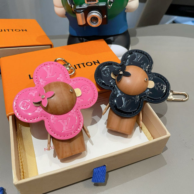 LV KEYCHAIN IN BLACK CALFSKIN AND WOOD