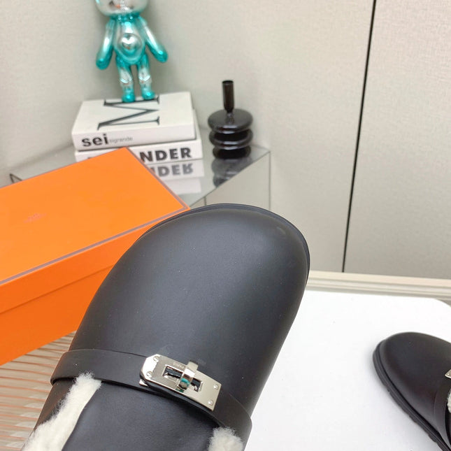 SLIP-ON MULE IN BLACK CALFSKIN AND SHEARLING LINING