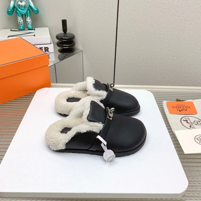 SLIP-ON MULE IN BLACK CALFSKIN AND SHEARLING LINING