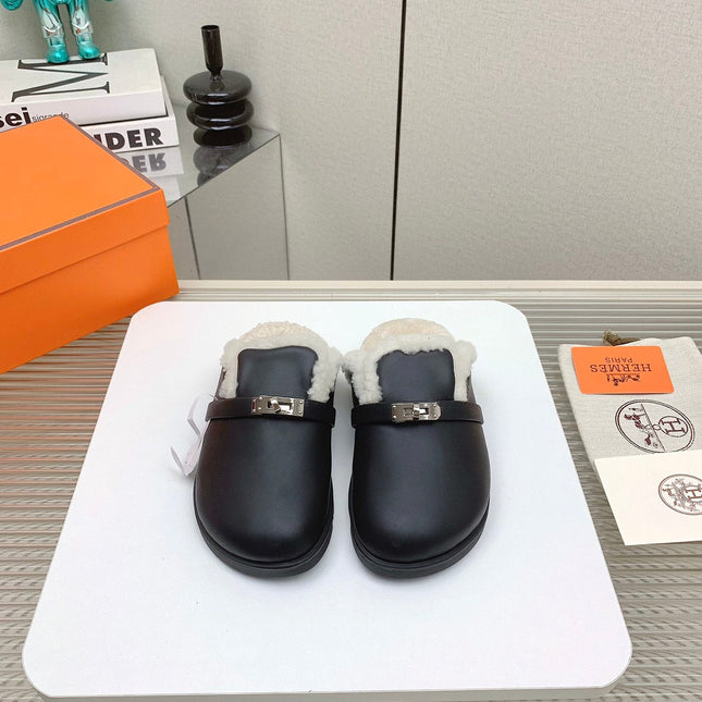 SLIP-ON MULE IN BLACK CALFSKIN AND SHEARLING LINING