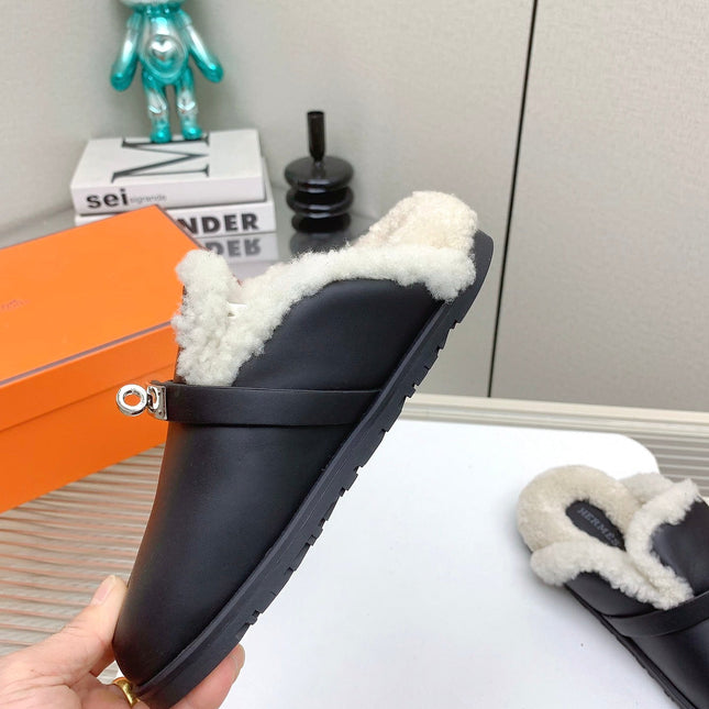 SLIP-ON MULE IN BLACK CALFSKIN AND SHEARLING LINING