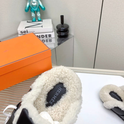 SLIP-ON MULE IN BLACK CALFSKIN AND SHEARLING LINING