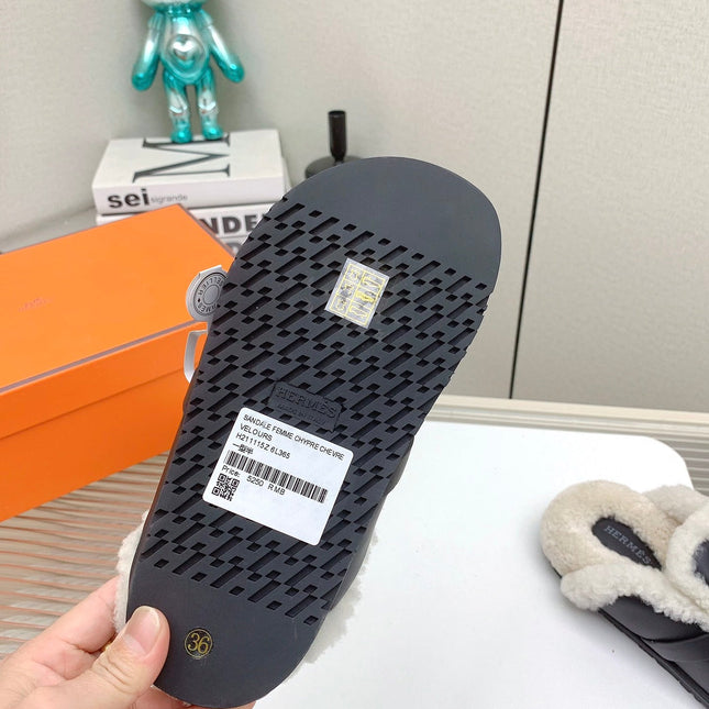 SLIP-ON MULE IN BLACK CALFSKIN AND SHEARLING LINING