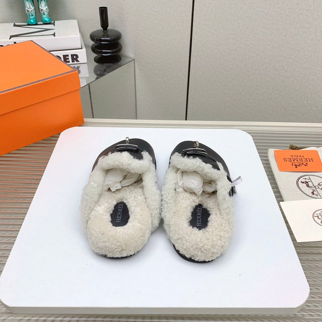 SLIP-ON MULE IN BLACK CALFSKIN AND SHEARLING LINING