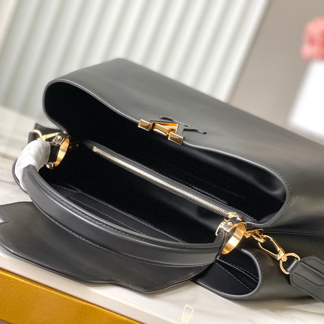 CAPUCINES SOUPLE GM 38 IN BLACK SMOOTH CALFSKIN GOLD HARDWARE