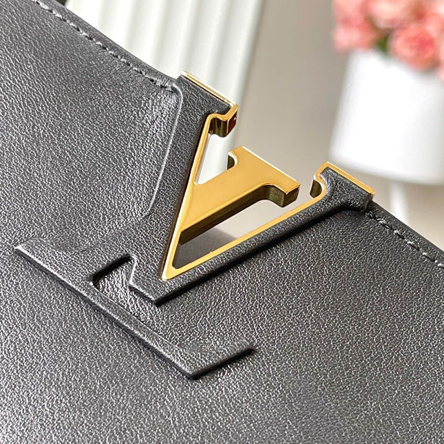 CAPUCINES SOUPLE GM 38 IN BLACK SMOOTH CALFSKIN GOLD HARDWARE