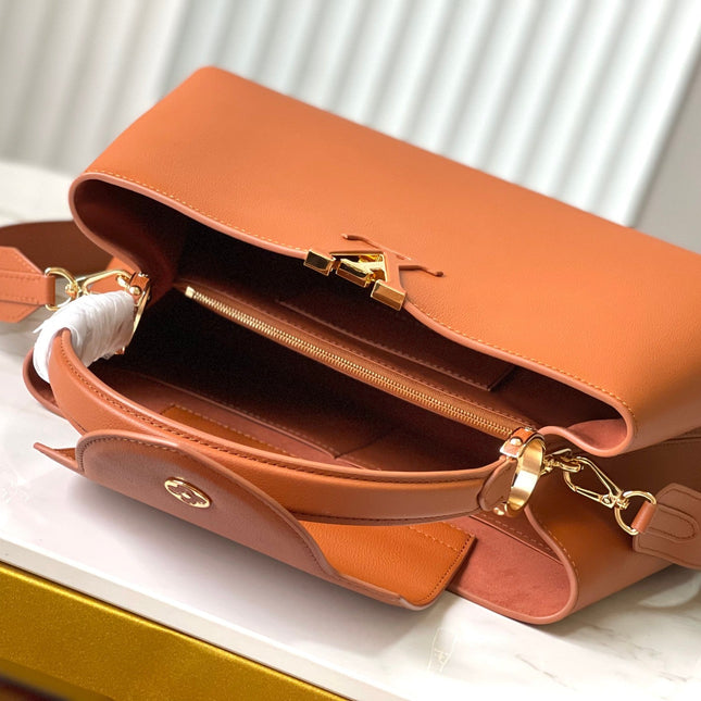CAPUCINES SOUPLE GM 38 IN COGNAC CALFSKIN GOLD HARDWARE