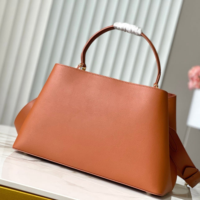 CAPUCINES SOUPLE GM 38 IN COGNAC CALFSKIN GOLD HARDWARE