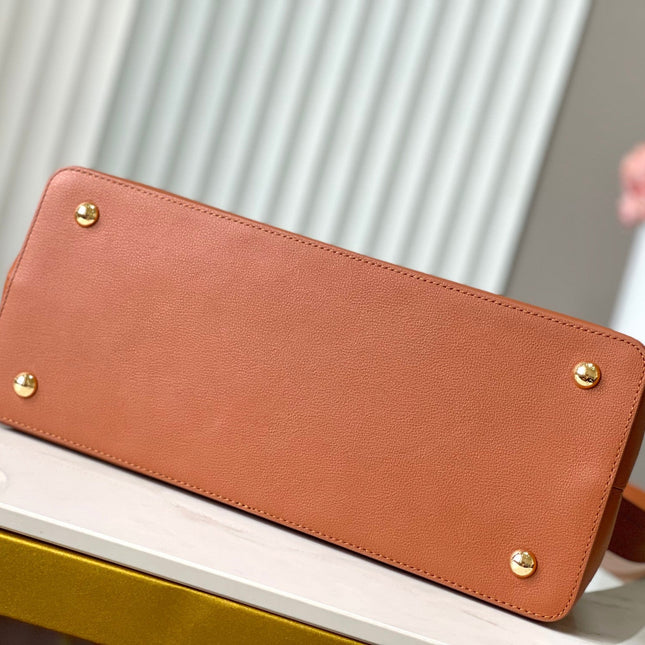 CAPUCINES SOUPLE GM 38 IN COGNAC CALFSKIN GOLD HARDWARE