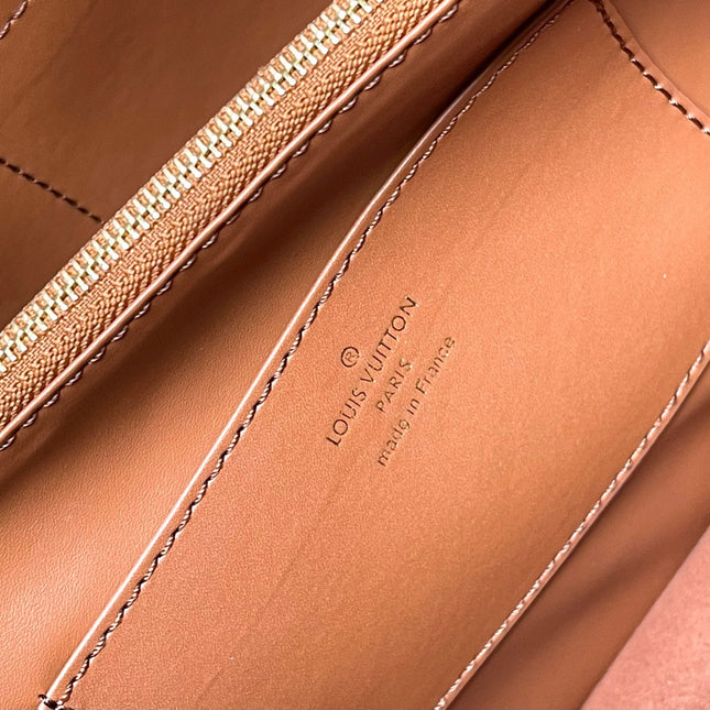 CAPUCINES SOUPLE GM 38 IN COGNAC CALFSKIN GOLD HARDWARE