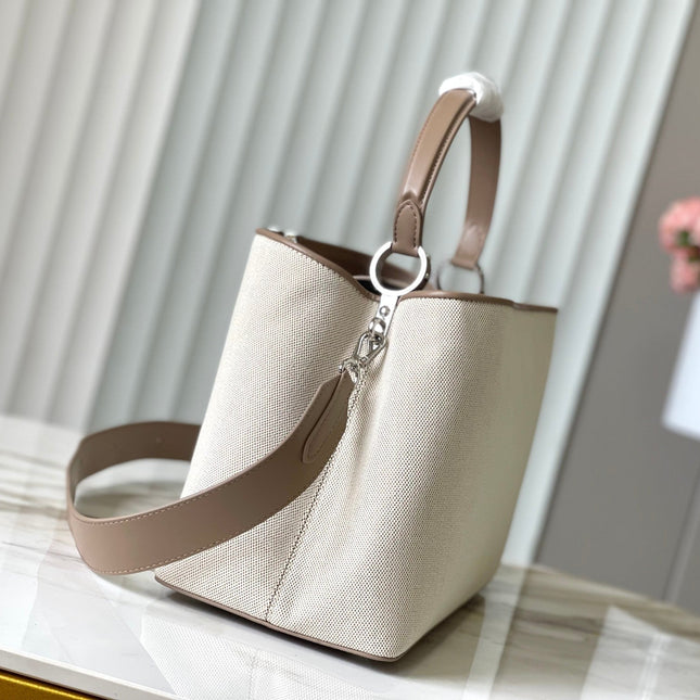 CAPUCINES SOUPLE GM 38 IN WHITE CANVAS AND TAUPE CALFSKIN TRIM