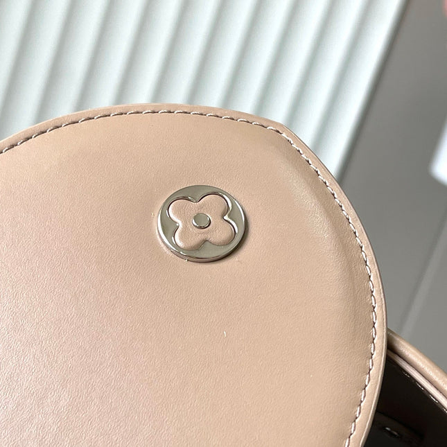 CAPUCINES SOUPLE GM 38 IN WHITE CANVAS AND TAUPE CALFSKIN TRIM