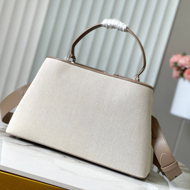 CAPUCINES SOUPLE GM 38 IN WHITE CANVAS AND TAUPE CALFSKIN TRIM
