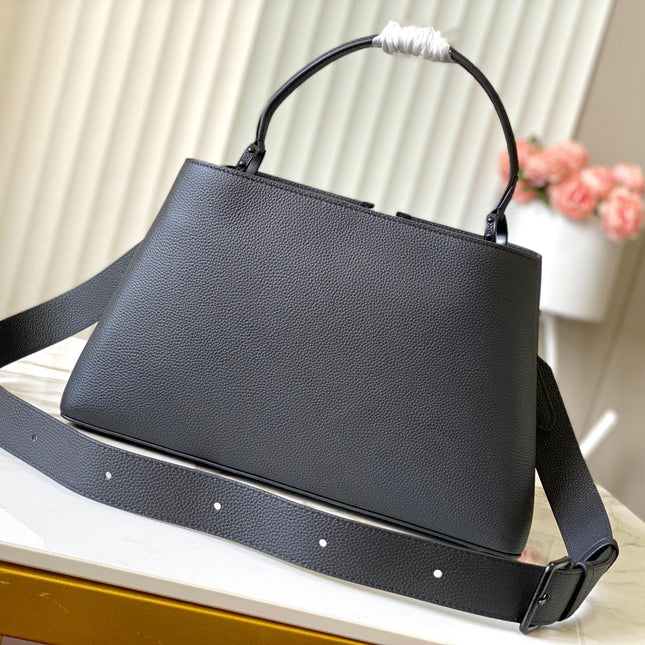 CAPUCINES GM SOUPLE 38 IN BLACK TAURILLON