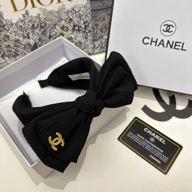 BLACK FABRIC HEADBAND WITH BOW 168569