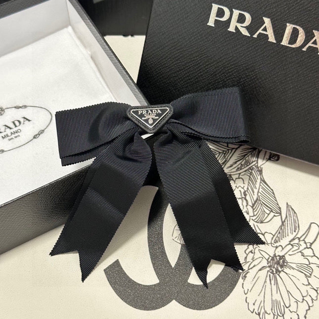 BOW HAIR CLIP IN BLACK FABRIC 406107