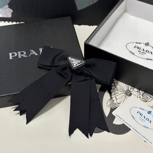 BOW HAIR CLIP IN BLACK FABRIC 406107