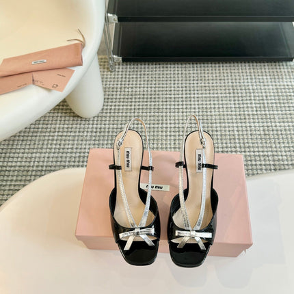 Black High Heels With Silver Bow