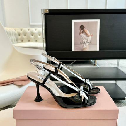 Black High Heels With Silver Bow