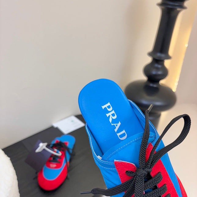 SNEAKER MULES IN BLUE NYLON AND RED SUEDE