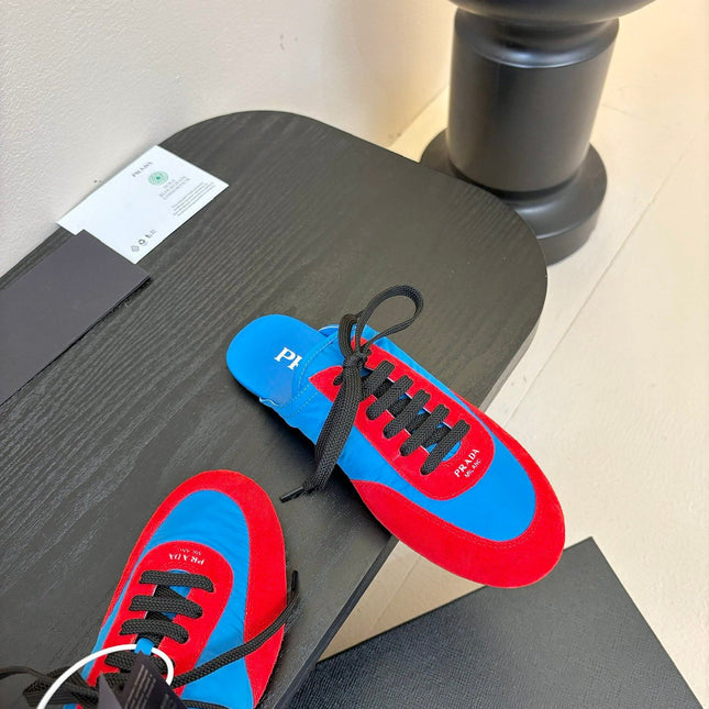 SNEAKER MULES IN BLUE NYLON AND RED SUEDE