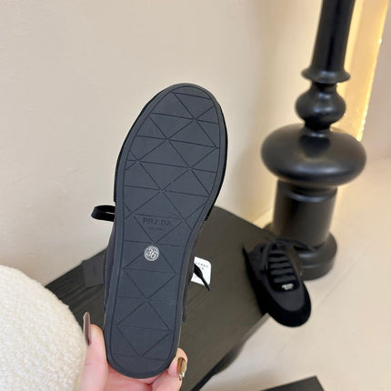 SNEAKER MULES IN BLACK NYLON AND SUEDE